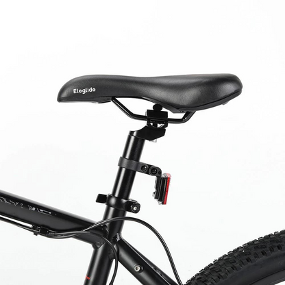 Eleglide M2 29" Electric Mountain Bike, 15.5MPH close up of the saddle in a white studio setting 