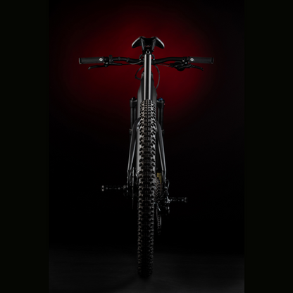 MBM Kairos 29" Electric Mountain Bike, Mid Drive 15.5MPH From Behind Red Highlight Dark Background