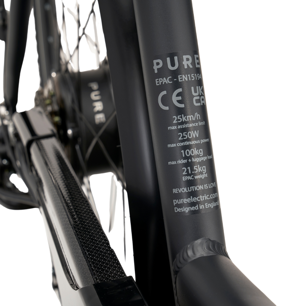 PURE Free City Step Thru Electric Bike, 15.5MPH Close up of the frame numbers in a white studio setting 